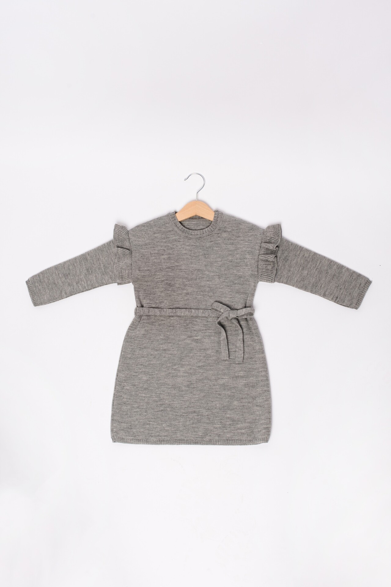 kids merino dress with modest design, suitable for everyday wear as well as for festive occasions. Sleeves are decorated with ruche details.